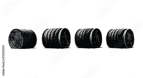 Four black tire valve caps in a row against a vector