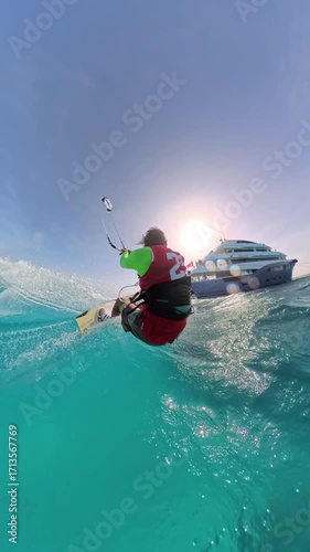 Wallpaper Mural Kitesurfer Jumping Near Cruise Yacht Sea Fox, Geisun Island, Red Sea, Egypt - May 2025 Torontodigital.ca