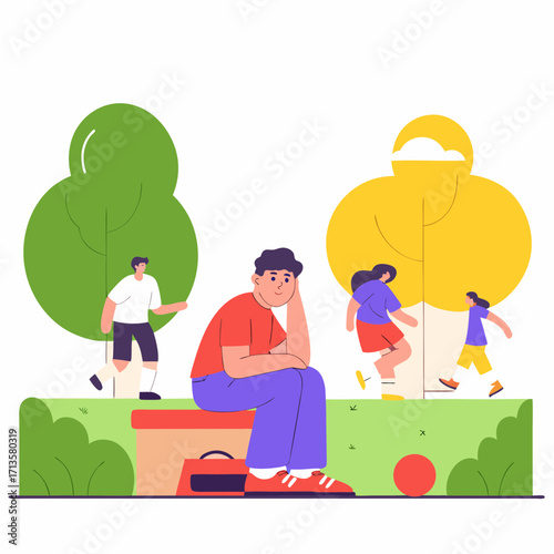 Young man sitting alone on bench in park while others play  