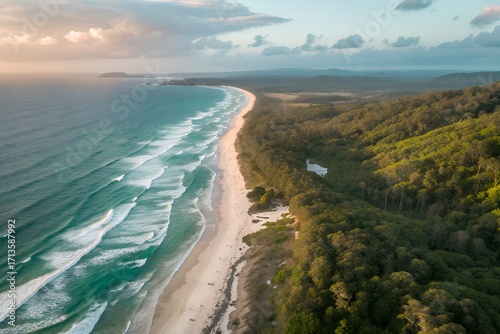 Aerial view of tallow beach in byron bay, australia at sunset time