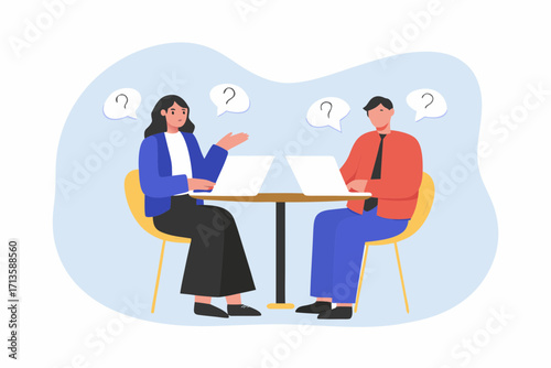 Two people sitting at a table with laptops and question marks above their heads symbolizing confusion or inquiry