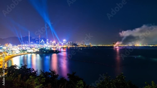 Cityscape at night, reflections shimmer