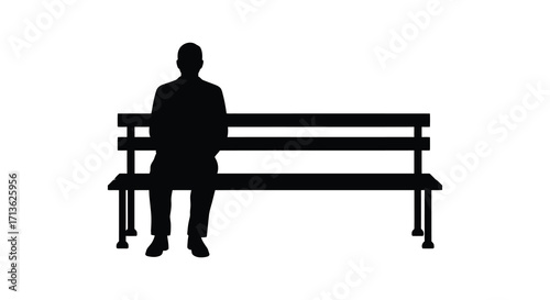 A solitary figure sits on a park bench in silhouette form