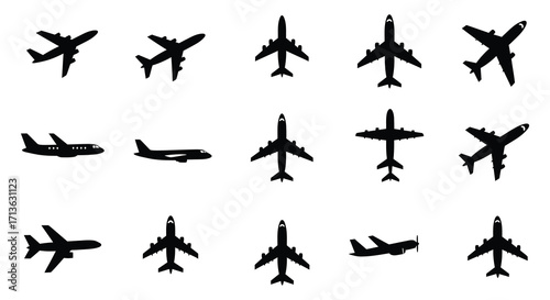 Collection of black silhouette airplane icons in various flight positions