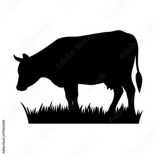 Vector art of black silhouette of a cow standing in grass