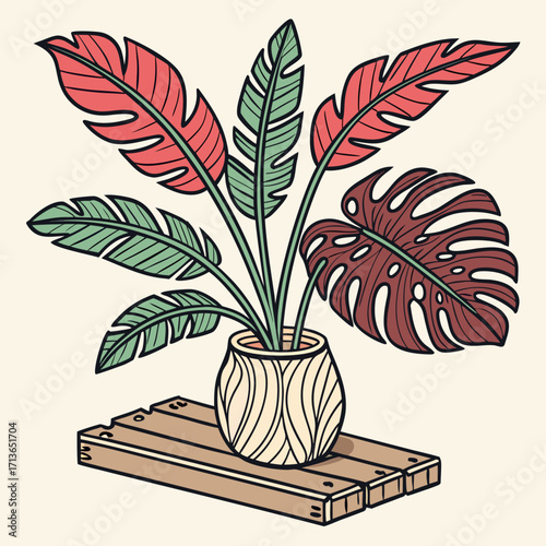 Tropical plant arrangement in pot on wooden pallet