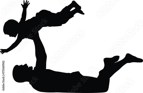 Joyful silhouette of parent lifting child high in playful acrobatic pose