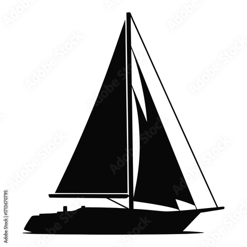 Silhouette of a majestic sailboat navigating the open waters under full sail