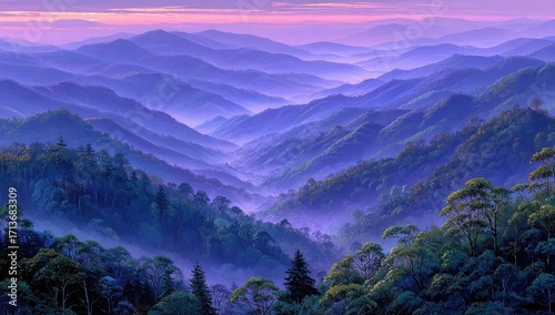 Misty, purplish-blue mountain range at sunrise, layers of valleys and forested hillsides shrouded in morning fog, creating a serene, atmospheric landscape