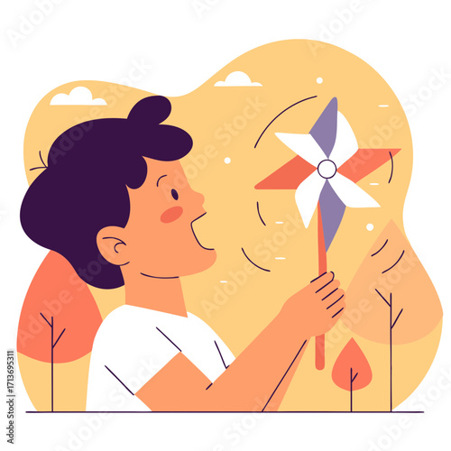 Young boy playing with colorful pinwheel outdoors in spring sunshine  