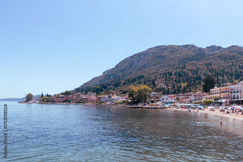 Fototapeta premium Mediterranean beach resort with crystal waters and luxury coastal hotels