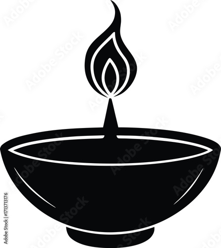 Traditional indian diya lamp illuminating the darkness