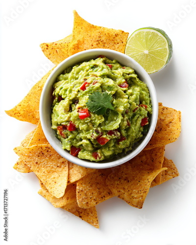 bowl of guacamole with nachos, avocado dip, isolated on white background