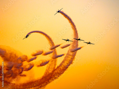 Wallpaper Mural Airshow performance in the warm light of the sunset made by skillful pilots on the skies of Bucharest Torontodigital.ca