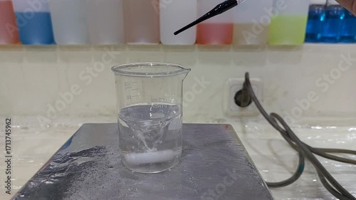 Purple Liquid Color Change in Laboratory Beaker Experiment
