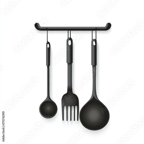Black Kitchen Utensils Hanging on a Wall.