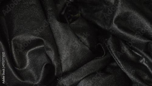 Texture and background with pattern, black silk fabric.
