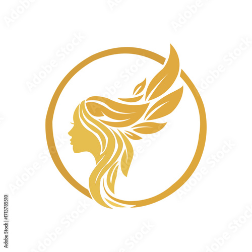 Golden profile of a woman with flowing hair and wings