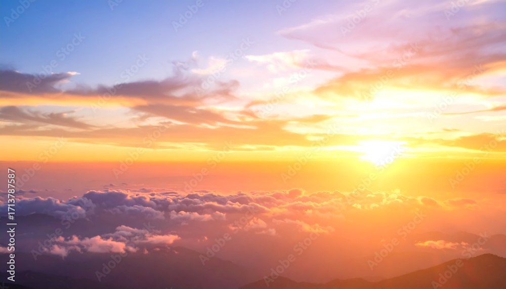 Obraz premium Sunrise over mountain cloudscape