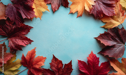 A Colorful Arrangement of Autumn Maple Leaves Forming a Circular Frame on a Soft Sky Blue Background Showcasing the Warmth and Beauty of Fall. generative ai