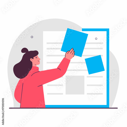 Young woman placing sticky notes on a bulletin board indoors  