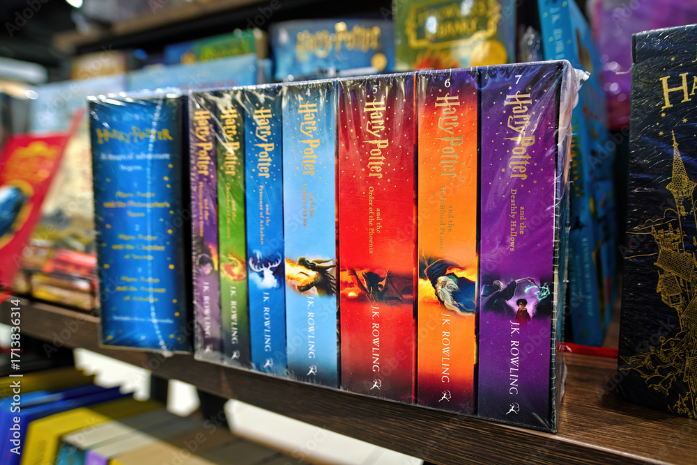 Fototapeta premium Minsk, Belarus. Jan 12, 2025. Collection of Harry Potter novels in english language written by J.K. Rowling displayed on bookstore shelf, popular fantasy literature series. Selective focus
