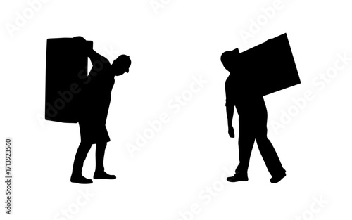 Silhouette of two people carrying large rectangular objects on their shoulders in black and white