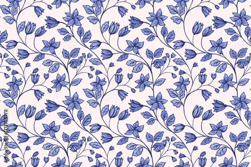 Seamless vector pattern with elegant blue flowers and delicate leaves on a soft beige background. Hand drawn botanical elements create a vintage and romantic feel for textiles, wallpapers, packaging