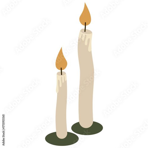 Two burning candles creating warm ambient light