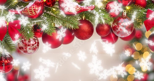 A festive winter arrangement with Christmas decorations and magically falling snow. Perfect footage for creating a festive atmosphere, greetings and New Year's projects.