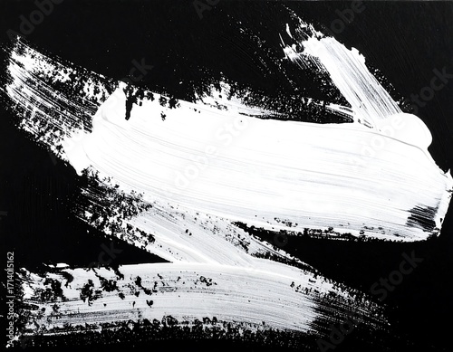 Abstract white paint brushstrokes on black background