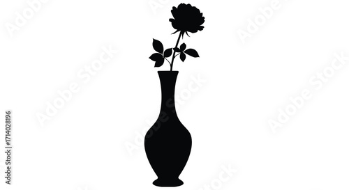 A single dark flower in a silhouette vase against a white background