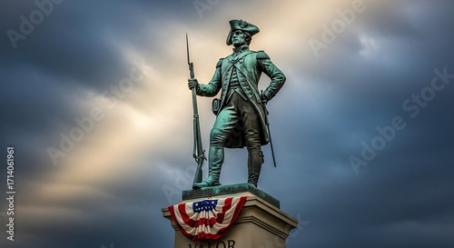A historic bronze statue of an American Revolutionary War Minuteman soldier standing guard against a dramatic, stormy sky.