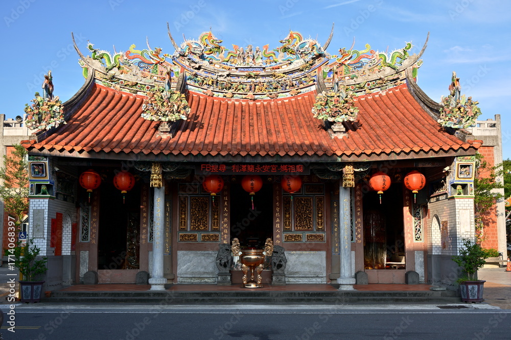 Naklejka premium Yilan, Taiwan - Sep. 13, 2025: Historic Yong'an Temple interior in Wujie Yilan dedicated to Mazu goddess, county heritage site with traditional Chinese religious architecture.