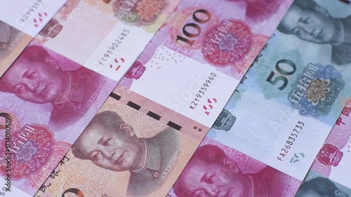 Chinese paper money, yuans in various denominations. China money as a business background for your design
