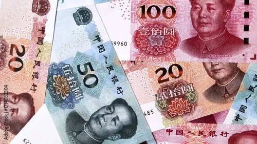 Chinese paper money, yuans in various denominations. China money as a business background for your design