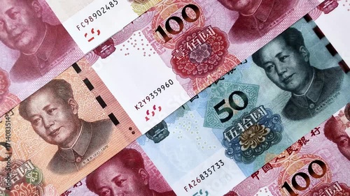 Chinese paper money, yuans in various denominations. China money as a business background for your design