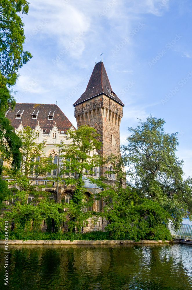 Naklejka premium Vajdahunyad Castle tower by the lake in Budapest