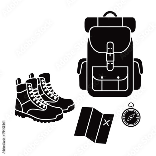 Hiking boots backpack map and compass for outdoor adventure