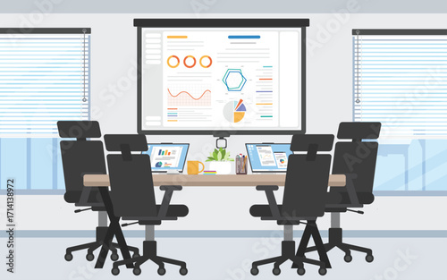 Working room with laptop on the table and monitor screen display on the center.