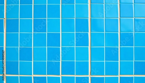 Close-up of a textured blue tile background, subtle grout lines visible,  vintage,  mosaic