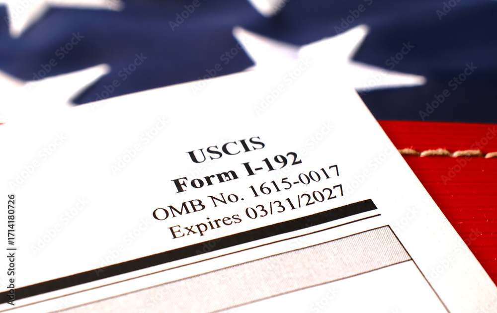 Fototapeta premium I-192 Application for Advance Permission to Enter as a Nonimmigrant blank form lies on American Flag background