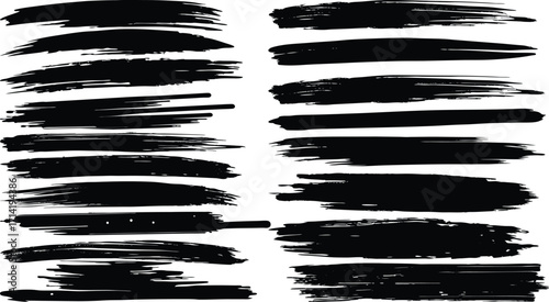 Vector design of a set of grunge brush strokes and ink splashes that create a blue watery texture
