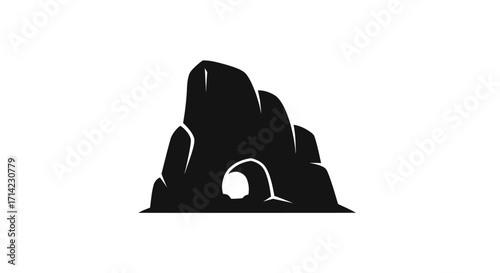 Silhouette of a rock formation with a natural archway in the center.