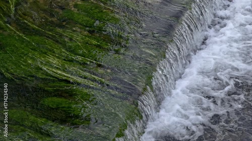 View from above of the Mirandela river, with waterfalls.