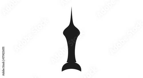 Silhouette of a tall architectural structure with a pointed top and unique design.