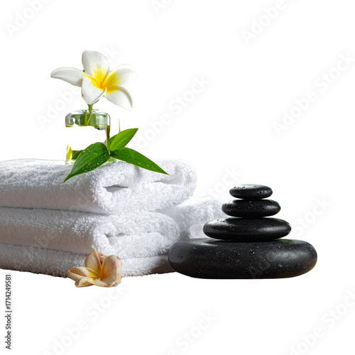 Spa concept with zen basalt stones and towels 