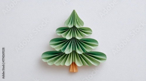 Decorative paper tree in green tones with layered design  