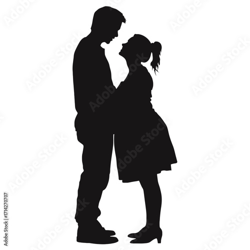 Silhouette of a couple embracing and looking at each other with love and affection in a tender moment
