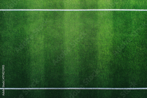 Top down view of lush green sports field with white lines, vibrant grass texture, outdoor stadium, fresh and well maintained, perfect for athletic activities and energetic games